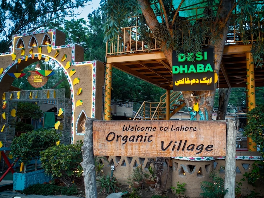 Welcome sign and entrance archway at Desi Dhaba, Lahore Organic Village