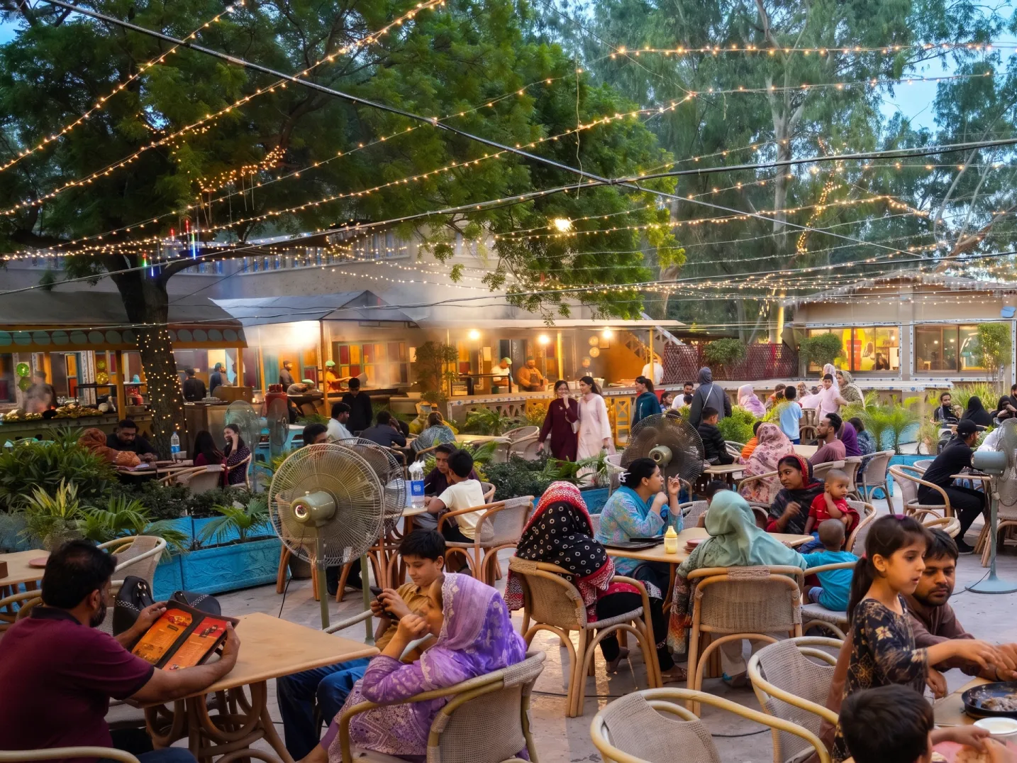Outdoor seating area next to the live kitchen at Desi Dhaba, Lahore Organic Village